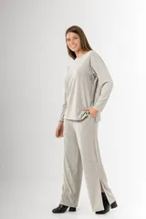 Pantalón palazzo gris de morley de vara ancha en algodón y viscosa, con bolsillos y cintura elastizada.