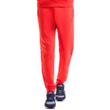 Pantalón deportivo tipo jogging de color rojo vibrante, con cintura ancha y puños ajustados en los tobillos. Presenta un pequeño logo bordado en la pierna derecha.