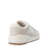 Championes urbanos Converse Wave Trainer OX, color beige natural con detalles en blanco y suela marrón.