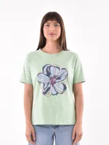 Remera blanca de algodón con estampado de limones y texto en azul.