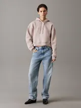 Buzo holgado con capucha Calvin Klein color lila, con logo CK bordado en relieve en el frente.