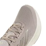 Championes de running Adidas Response Super, color beige con detalles plateados y suela blanca.
