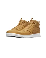 Championes de caña media Nike Court Vision Mid color marrón, con suela blanca y logo Nike en el lateral.