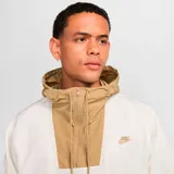 Campera anorak Nike Club Marina Gfx, color beige y blanco, con capucha y cierre parcial con cremallera.