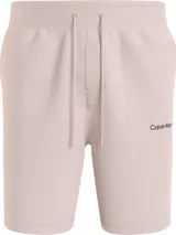 Short deportivo color rosa claro de algodón, con cintura elástica ajustable con cordón, bolsillos laterales y logo de Calvin Klein estampado en la pierna izquierda.