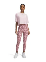 Calza deportiva de mujer con estampado abstracto en tonos rosados.