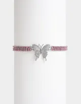 Gargantilla con triple hilera de strass rosa y dije de mariposa plateada con strass.