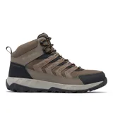 Bota de trekking de caña media Columbia Strata Trail Mid WP, color marrón con detalles en negro y cordones bicolores. Cuenta con tecnología impermeable Omni-Tech y suela de caucho de alta tracción Omni-Grip.