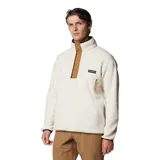 Buzo de polar tipo sherpa para hombre, modelo Helvetia Snap Fleece de Columbia. Presenta un diseño de cuello alto con cartera de botones a presión en color marrón, bolsillo con cierre en el pecho y ribetes elásticos en puños y bajo.