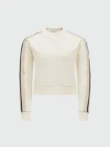 Sudadera color crema de corte holgado con cuello redondo y mangas largas. Presenta una banda lateral con diseño de tejido calado y logo de la marca en la manga izquierda.