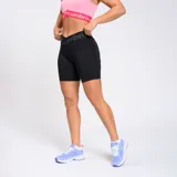 Calza biker negra de lycra con cintura alta con el logo de Umbro en gris.