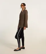 Pantalón legging negro de rib con cintura elástica y piecito.