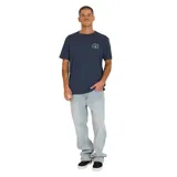 Remera azul de manga corta con logo de Volcom estampado en el pecho.