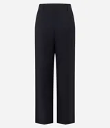 Pantalón de mujer modelo pantalona Wide Leg color negro, confeccionado en tejido flame (viscosa y poliéster). Presenta trabillas en la cintura, cierre tradicional y frisos laterales.