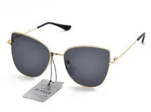 Lentes de sol con marco dorado y lentes grises.