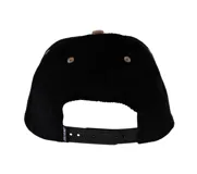 Gorro de pana negro con visera marrón y logo de Santa Cruz bordado en el frente.