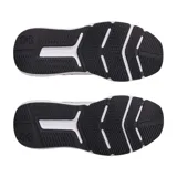 Championes Under Armour Charged Commit TR 4, color gris claro con logo negro y suela blanca.
