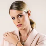 Aros tipo argolla en plata 925 con detalles en oro.