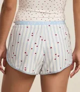 Short de pijama con cintura elástica y estampado de rayas verticales con corazones.