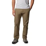 Pantalón de hombre color marrón, de corte recto, con bolsillos laterales, bolsillos de seguridad con cierre y bolsillo para cuchillo. Cuenta con tecnología Omni-Shade UPF 50.