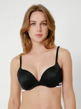Sujetador push up negro con tirantes regulables y banda elástica con logo Tommy Hilfiger.