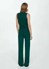 Pantalón largo de punto fino color verde oscuro, con diseño wideleg y cintura elástica.