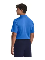 Remera polo Under Armour Matchplay para hombre, color gris jaspeado con logo negro en el pecho.