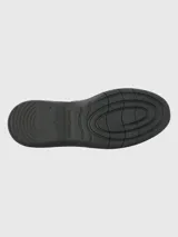 Zapato de cuero negro con ajuste de velcro, suela de goma EVA y plantilla de cuero y algodón orgánico.