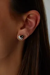 Aros de acero quirúrgico hipoalergénico con diseño de Yin Yang.