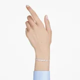 Pulsera bañada en rodio con diseño de cristales transparentes de talla redonda y cierre deslizante.