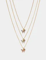 Set de tres collares dorados con dije de mariposa con strass y dije rectangular con la inscripción "BFF".