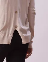 Cardigan tejido color beige, marca Vila Milano, con frente abierto y mangas largas.