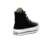 Championes Converse Chuck Taylor All Star de caña alta, color negro, con plataforma blanca y cordones blancos.