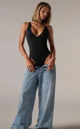 Body modelador negro de lycra, colaless, con aro y breteles regulables.