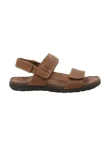 Sandalias marrones de cuero con tiras ajustables con velcro y suela de goma.