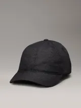 Gorra negra con logo Calvin Klein en jacquard en toda la prenda.