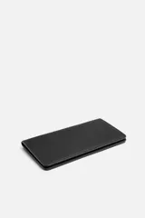 Billetera grande de cuero negro con seis ranuras para tarjetas, dos ranuras laterales, monedero con cremallera y ranura en la parte posterior.