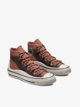Championes Converse Chuck Taylor All Star Move de caña alta, color terracota con detalles transparentes y suela chunky blanca.