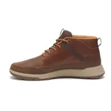 Bota unisex Caterpillar Quest Mid de cuero color marrón, con cordones y suela de goma color beige.