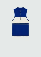Top azul con panel blanco horizontal, cuello perkins y cierre de cremallera en el cuello.
