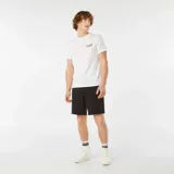 Bermudas negras de corte recto con bolsillos laterales con cierre de cremallera.