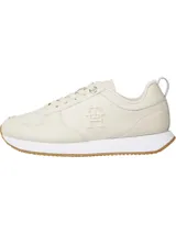 Zapatilla deportiva de estilo running con logo de Tommy Hilfiger, suela ligera y acabado distintivo.