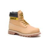Bota de trabajo color crema con detalles en negro y cordones amarillos, diseñada para mayor resistencia y comodidad.