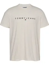 Remera color crema de corte recto y cuello redondo. Estampa frontal con el logo de la marca Tommy Jeans.