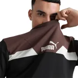 Remera Puma Power Colorblock de hombre, con mangas cortas y diseño colorblock en azul marino, celeste y amarillo. Logo de Puma estampado en el pecho.