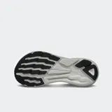 Championes de running Altra Experience Flow, color blanco con detalles en negro. Presentan malla técnica bicolor, drop bajo de 4 mm y entresuela de espuma ligera moldeada por compresión. Cuentan con ajuste FootShape característico de Altra.