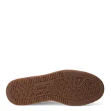 Championes Puma Caven 2.0 blancos con detalles en negro y dorado, con cordones y logo de la marca en el lateral.