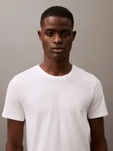 Pack de tres remeras blancas de algodón de cuello redondo con logo bordado en el dobladillo.