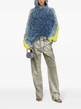 Pantalón de jean Diesel modelo 1988, de corte boyfriend, tiro bajo, pierna tapered y largo completo. Confeccionado en denim de algodón con acabado descolorido con efecto mármol, lámina de Mylar y detalles láser.