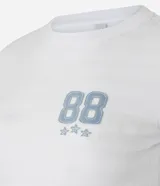 Remera blanca de algodón con cuello redondo, manga corta y estampa lettering college en el frente.